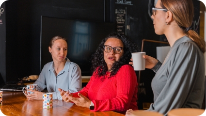 women sharing ideas over coffee women sharing ideas over coffee
